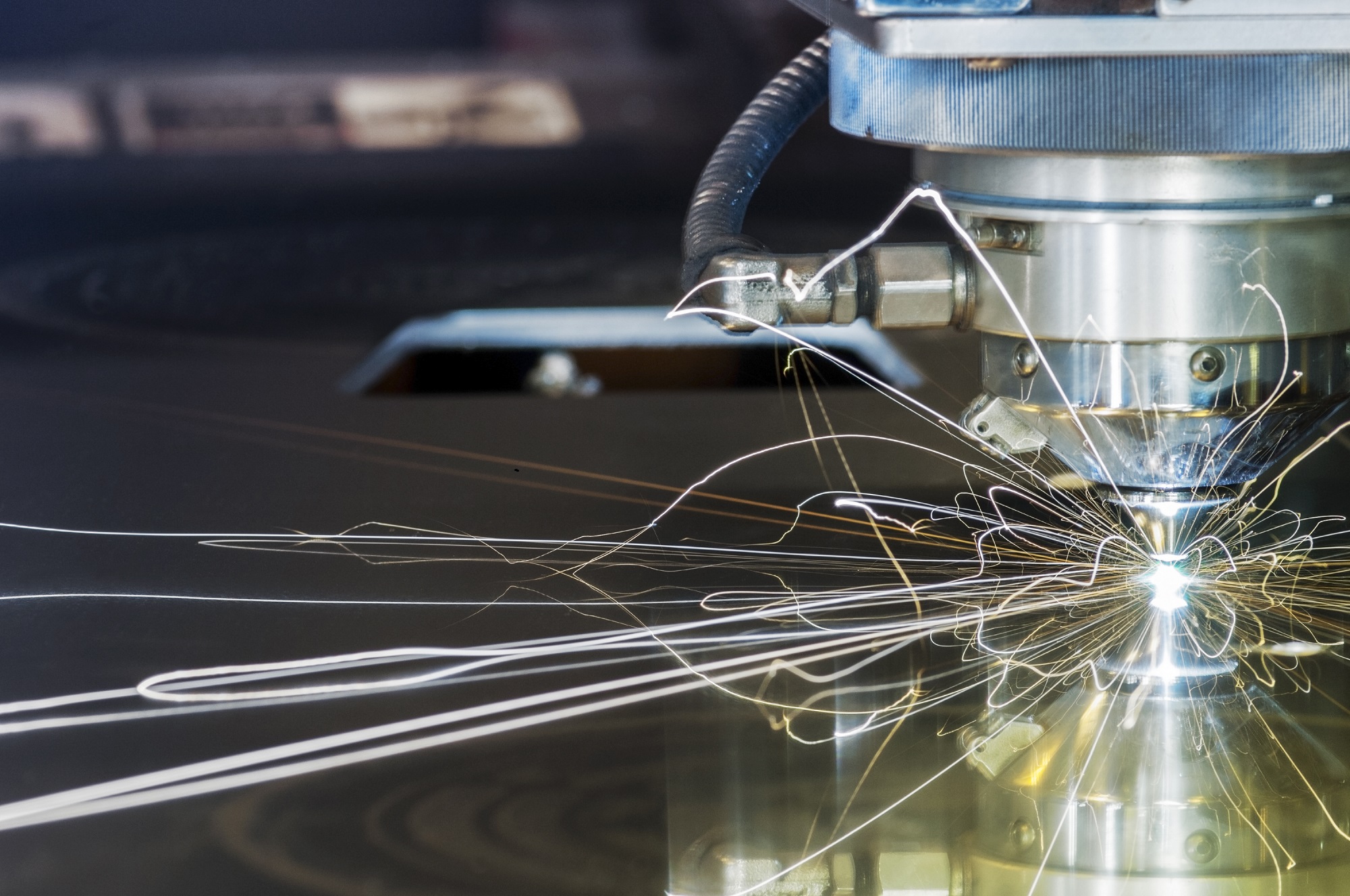 Reliance first-step metal fabrication services including beam cutting, laser processing, coil slitting, and machining equipment operating in a production facility.