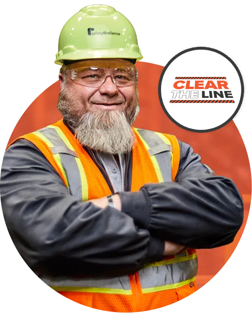 Reliance worker with security vest and helmet, and clear the line batch logo